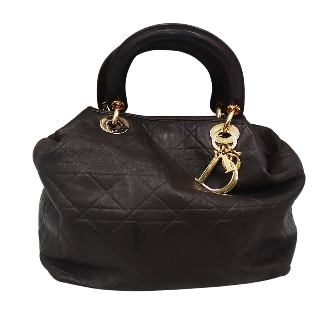 COUTURE. Christian Dior 'Lady Dior' Leather Purse.: Christian Dior 'Lady Dior' brown leather purse with gold hardware. With Dior gold-tone letter charms and structured handles. Accompanied by a Dior dust bag. From an East Patchogue, NY estate. Dimensio