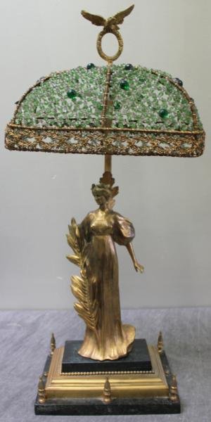 Beautiful Gilt Bronze Figural Lamp.: Signed Gruber. Unusual original beaded glass shade. With marble plinth and base. From an Old Westbury, NY estate. Dimensions: base - 7.125" wide x 9.75" deep; Overall height - 26" high. Condition: Sha