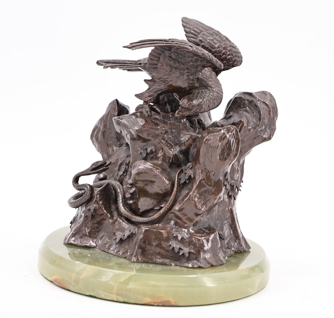 UNSIGNED Bronze Sculpture Of An Eagle On Rocks.: Very well executed with nice original brown patina. Apparently unsigned. From a Stamford CT estate. Dimensions: Bronze 7.25" h; 8.5" h overall & 7" dia.