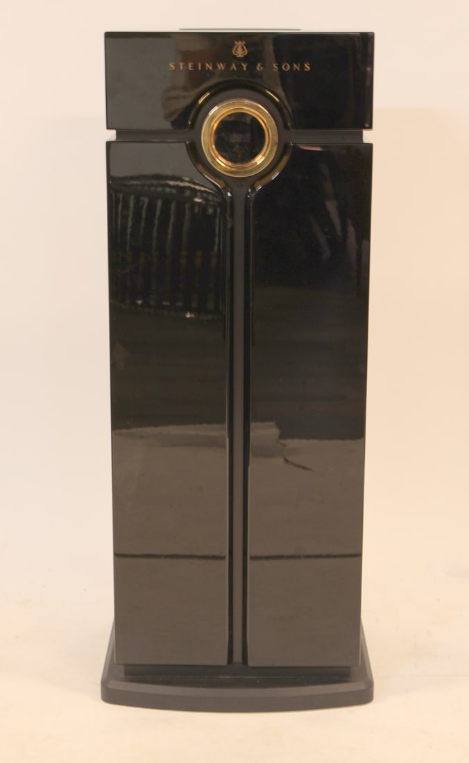 STEINWAY & SONS Head Unit Processor.: The Head Unit Processor has a distinctive volume wheel crafted from 1 kg of gold-plated brass and mounted on precision-machined Swiss bearings. The Head Unit Processor is an in-room statement processo