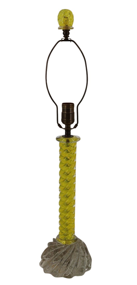 Barovier & Toso Glass Lamp.: A bright, canary yellow glass column lamp atop a clear shaped glass base. The base with a "Barovier & Toso", "Made in Italy" label, and a second old, illegible label. With a ye
