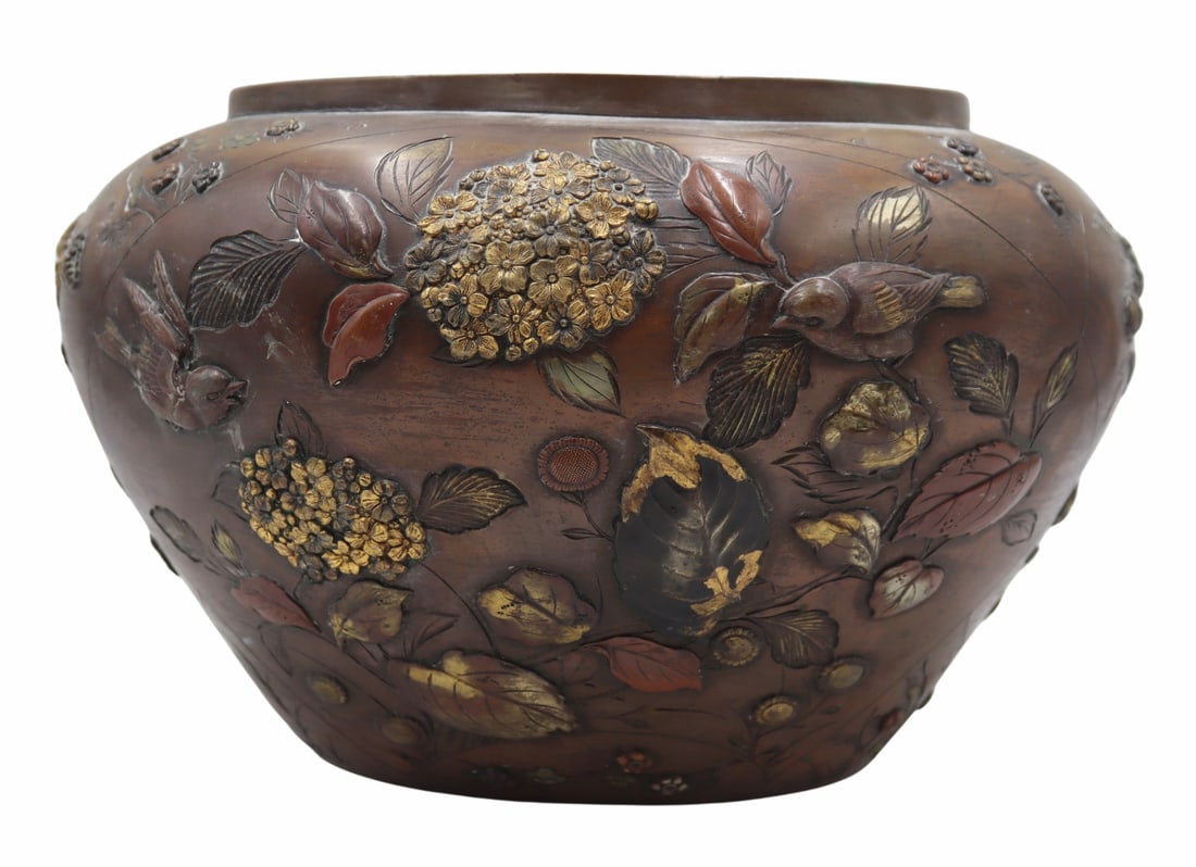 Signed Japanese Mixed Metal Vase with Birds and: Flowers. Signed Japanese mixed metal vase with high relief depictions of birds and flowers. Displaying a two-character mark. From a Manhattan, NY estate. Dimensions: vase measures approx. 7.5" h.