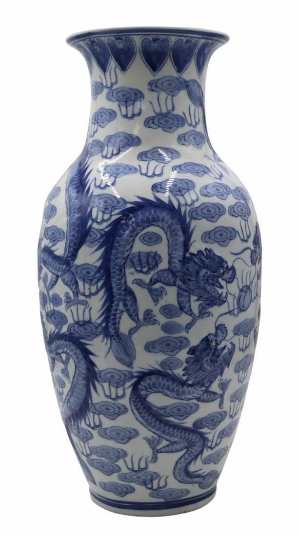 Chinese Blue and White Dragons Vase.: Chinese blue and white vase displaying dragons chasing flaming pearls and surround by flames and ruyi clouds. From a Larchmont, NY estate. Dimensions: vase measures approx. 18.25" h.