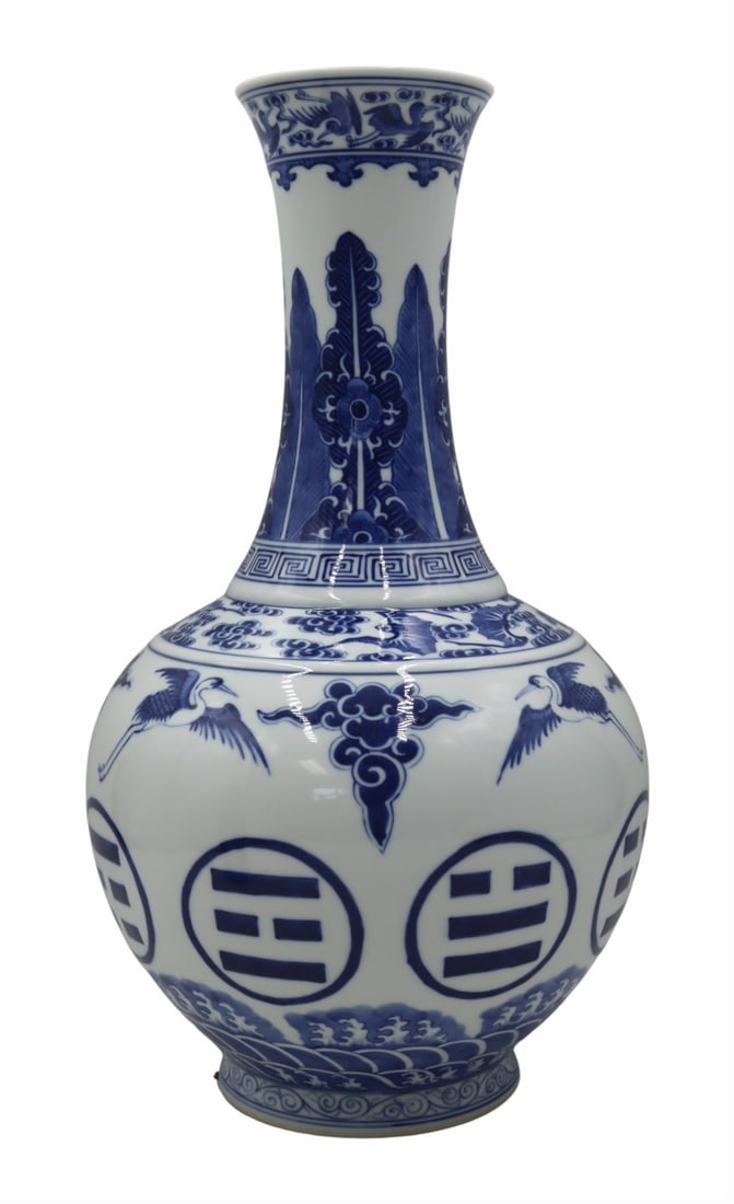 19th Century Chinese Blue and White Vase.: 19th century Chinese blue and white vase decorated with herons, ruyi clouds, bats, waves, etc. Apocryphal Yongzheng mark to the underside. From a Delaware estate. Dimensions: vase measures approx. 15&