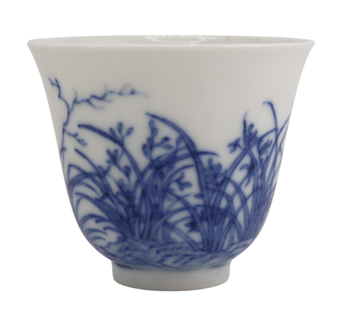 Chinese Blue and White Cup, KangXi Mark.: Chinese blue and white bell shaped cup displaying flora with calligraphy. Six-character KangXi mark to the underside. From a Delaware estate. Dimensions: cup measures approx. 2.675" in diameter x