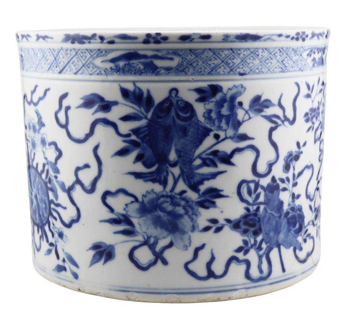 Chinese Blue and White Brush Pot.: Chinese blue and white brush pot displaying auspicious items set amongst flora. From an E 72nd St, Manhattan estate. Dimensions: brush pot measures approx. 8" in diameter x 6.125" h.
