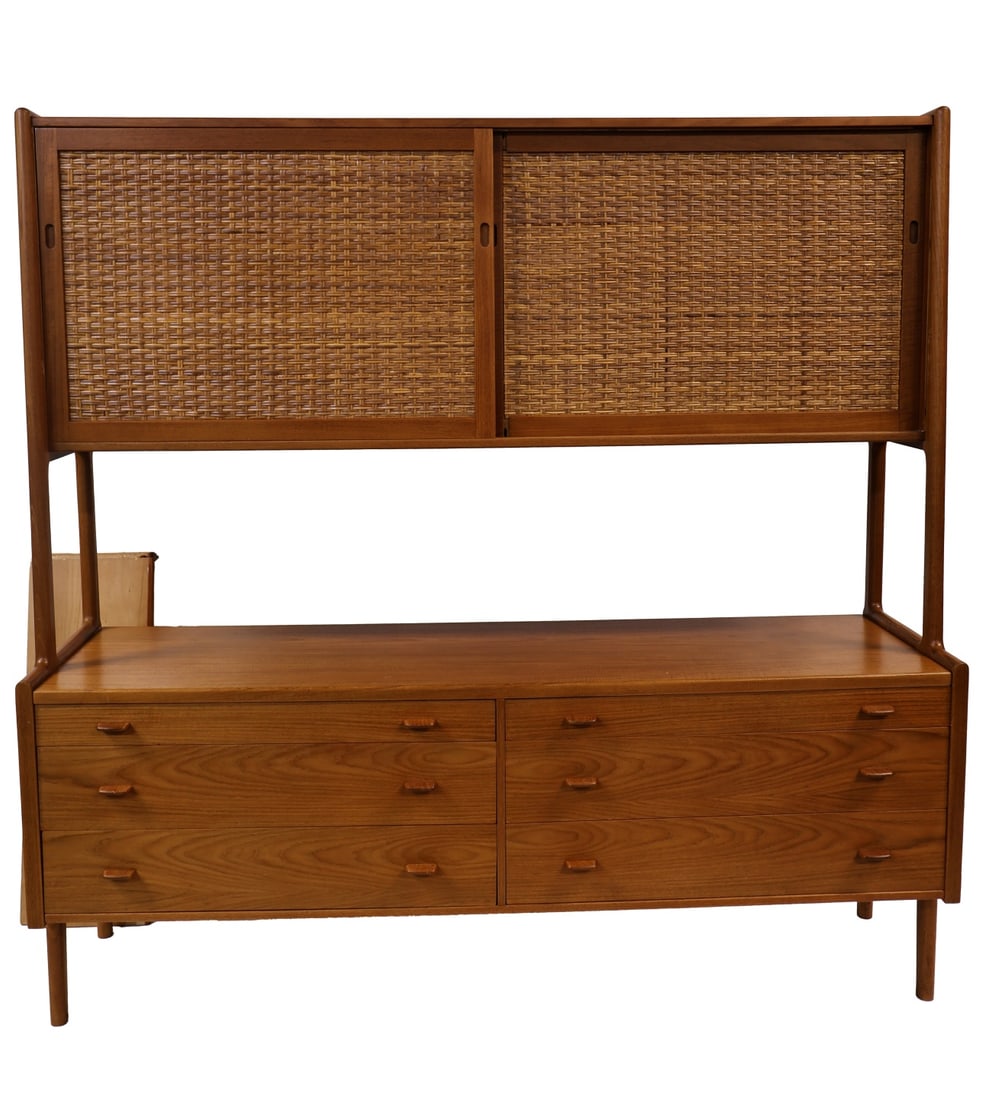 Hans Wegner RY20 Teak Sideboard.: Hans Wegner (Model Ry-20) Mid Century Teak and cane two-tier buffet sideboard for Ry Mobler. Features six side by side drawers on the bottom and five adjustable shelves behind two sliding doors with w