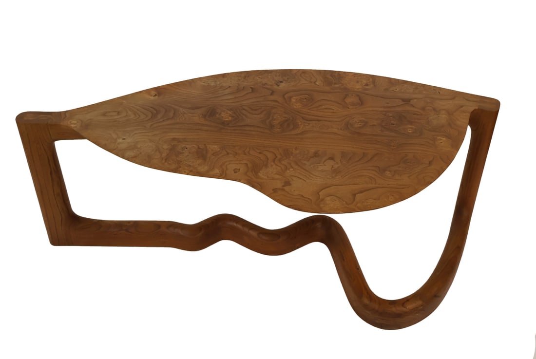 WENDELL KEITH CASTLE (USA ,1932-2018).: 'Boston Coffee Table'. 1979. Burl walnut. Signed and dated. Note: Castle made several versions of the table in different hardwoods, including another in elm for the Museum of Fine Arts, Boston, Boston