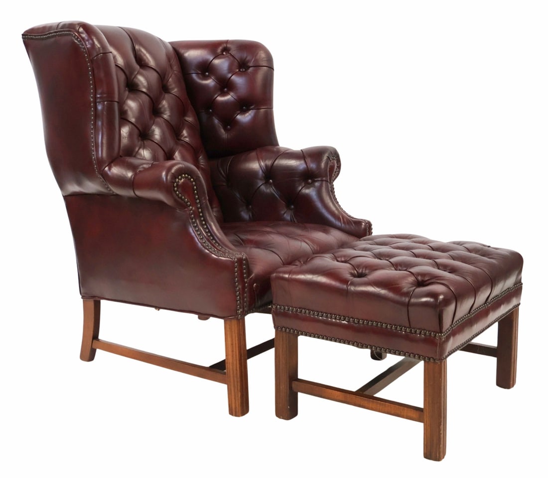 Vintage Leather Upholstered Wing Chair & Ottoman.: From a West 90th St NYC estate. Dimensions: Chairs: 41" h x 32" w x 32" d. Ottoman: 15" h x 23" w x 18" d.