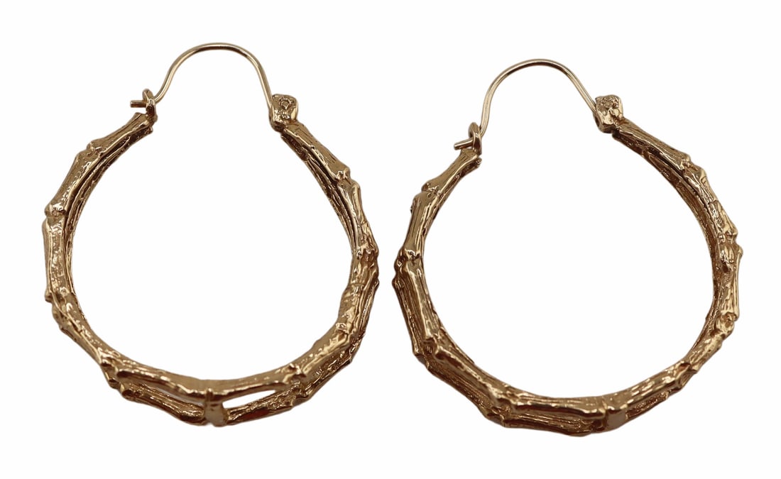 JEWELRY. Pair of 13.25kt Gold Double Bamboo Hoops.: Pair of 13.25kt yellow gold tapered double bamboo form hoop earrings. Apparently unmarked. Total approx. weight of the earrings is 4.0 dwt (gross). From a Stamford, CT estate. Dimensions: earrings mea
