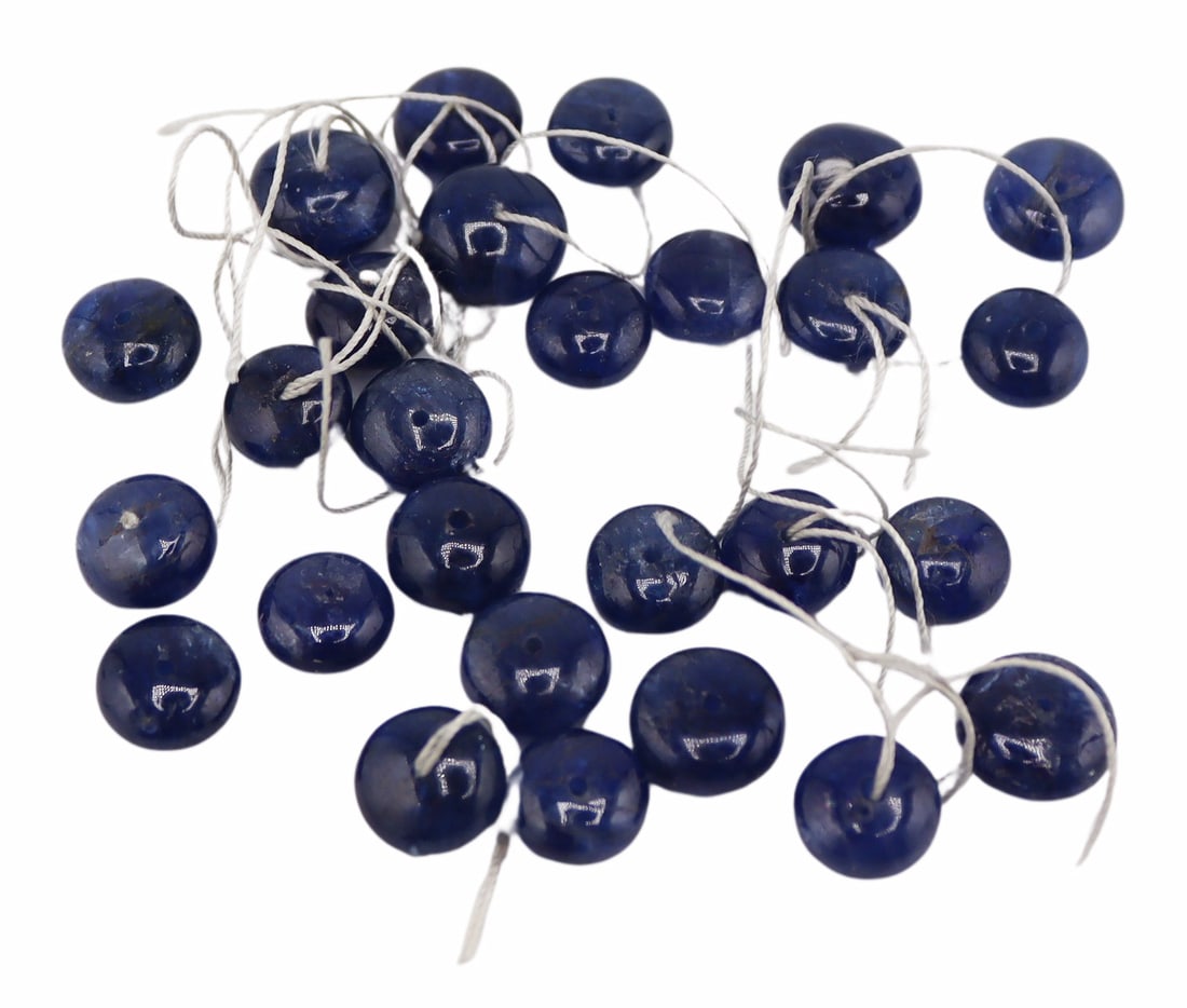 JEWELRY. (27) Polished Sapphire Beads.: In the process of obtaining a GIA Country of Origin Report on a selection of beads. Total approx. weight of the beads is 29.5 grams (gross). From a Scarsdale, NY estate. Dimensions: the largest bead m