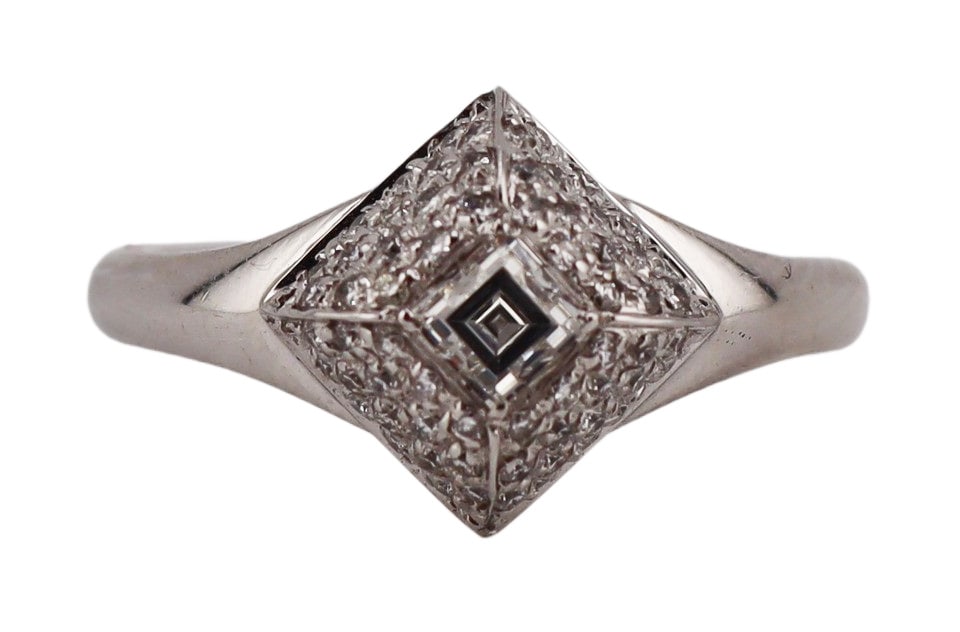 JEWELRY. Italian 18kt Gold and Diamond Ring.: Italian 18kt white gold ring displaying a lozenge or diamond form raised pendant with central Asscher cut diamond surrounded by pave diamonds. Center diamond measures approx. 4.0mm x 4.0mm. Stamped, &