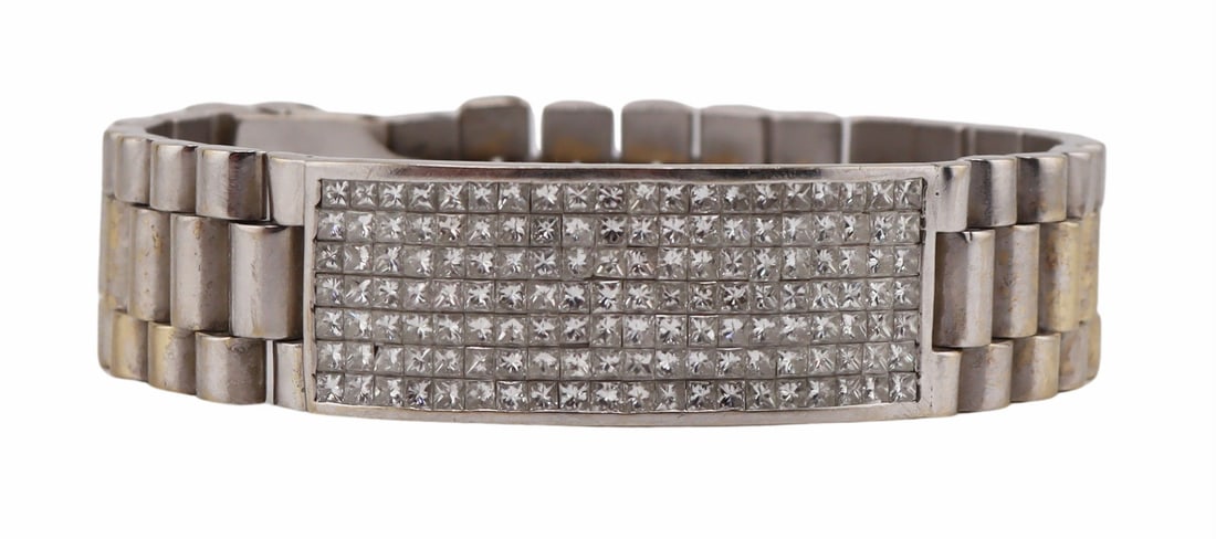 JEWELRY. Men's 18kt Gold & 4+ct Diamond Bracelet.: Men's 18kt gold ID style bracelet displaying a central panel of (120) square faceted diamond on a single fold watch band style bracelet. Total approx. diamond weight of 4+ cts; each diamond measures a