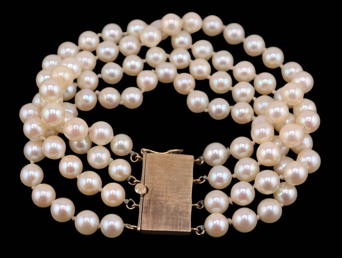 JEWELRY. 13.5kt and Multi-Strand Pearl Bracelet.: Vintage multi-strand bracelet comprised of individually knotted pearls measuring approx. 6.0mm each. With a 13.5kt yellow gold rectangular clasp with a Florentine finish. Stamped, "14K" to t
