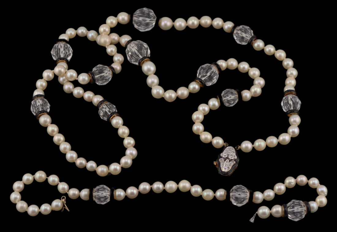 JEWELRY. DAVID WEBB 18kt Gold Diamond Pearl, Onyx: And Crystal Necklace. Includes a David Webb 18kt yellow gold, carved onyx and pave diamond clasp displaying (2) raised Old European cut diamonds. Clasp suspends one of what should be two individually 