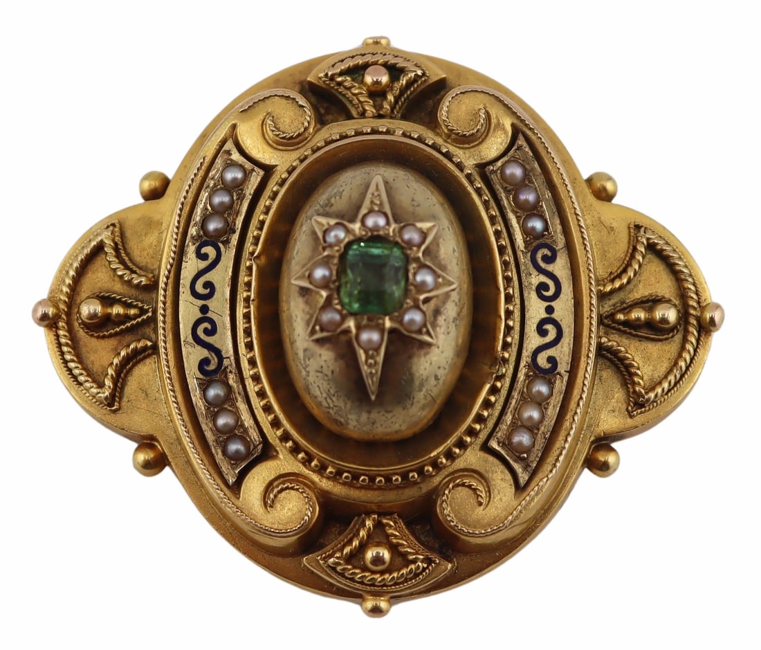 JEWELRY. Victorian Emerald, Seed Pearl, and Enamel: Brooch or Pendant. Victorian gold pendant or brooch with central raised oval pendant accented by an applied star with central faceted emerald and a surround of seed pearls. Additional geometric decora