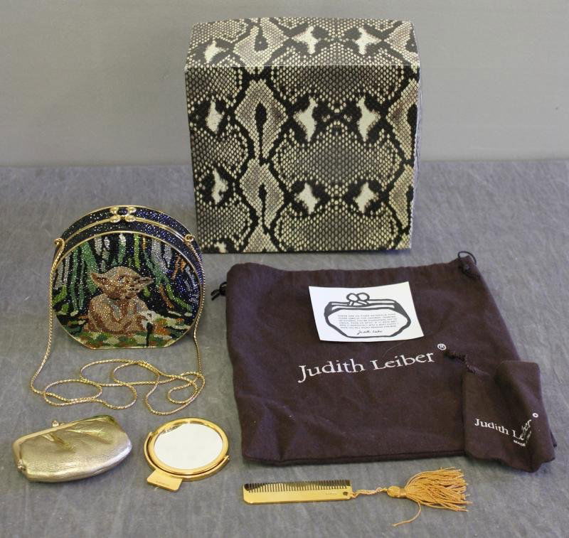 Judith Leiber Yoda Minaudiere / Purse.: Accompanied by Judith Leiber comb, coin purse and mirror. In original box with dust jacket. "Judith Leiber New York" plaque on interior. From a Yonkers, NY location. Dimensions: 4.875" w x 2.25" d x 5