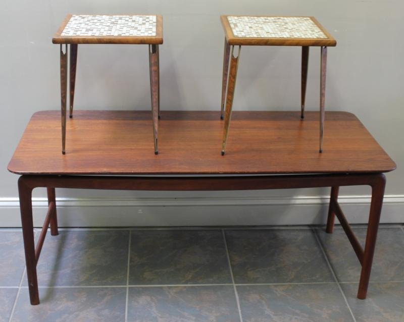 Midcentury Furniture Lot.: Includes a teak coffee table with John Stuart button and a small pair of tile top tables. From a New Hyde Park, NY location. Dimensions: Coffee table - 51" w x 22" d x 22" h; Pair of tables - 13.75" w