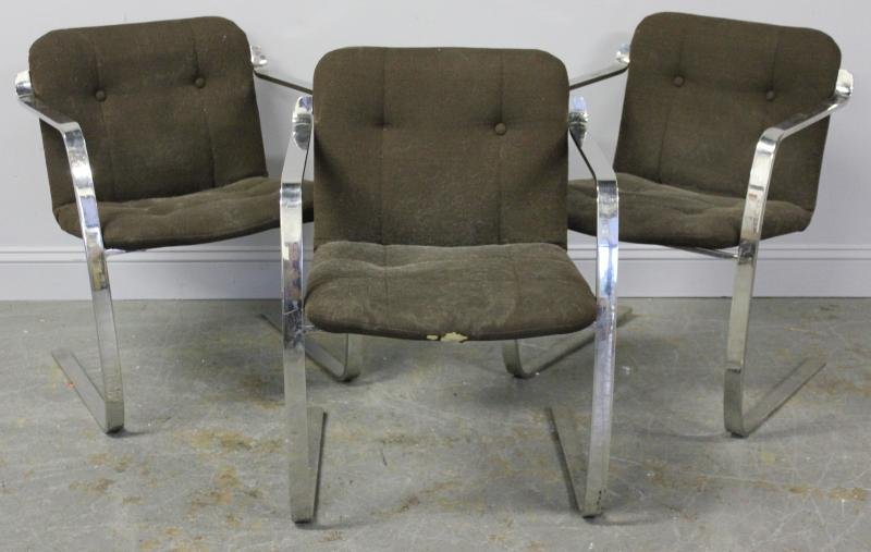 Midcentury Set of 3 Chrome & Upholstered Chairs.: In the style of Milo Baughman. From a Rye, NY estate . Condition: Upholstery used. Dimensions: 23" w x 23" d x 39" h.