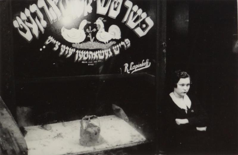 SHAHN, Ben. Photograph "East Side Merchants, April: 1936." Unsigned. Believed to have been printed within a year of Shahn's death from a roll of film found in his studio. Image is illustrated in "Ben Shahn's New York: The Photography of Modern Times" (