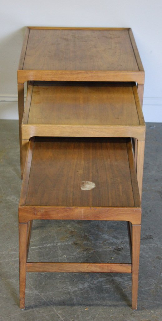 Midcentury Wood Nesting Tables.: From an Englewood, NJ estate. Dimensions: Range from 28" w x 21" d x 20" h to 25" w x 15" d x 15.5" h.