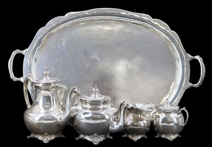STERLING. Mexican Jose Marmolejo Sterling Tea: Service. Comprised of a teapot, coffeepot, lidded sugar, and creamer. Accompanied by a Mexican Jose Marmolejo sterling footed tray with handles. All items are stamped "JMS 0.925 Sterling". T