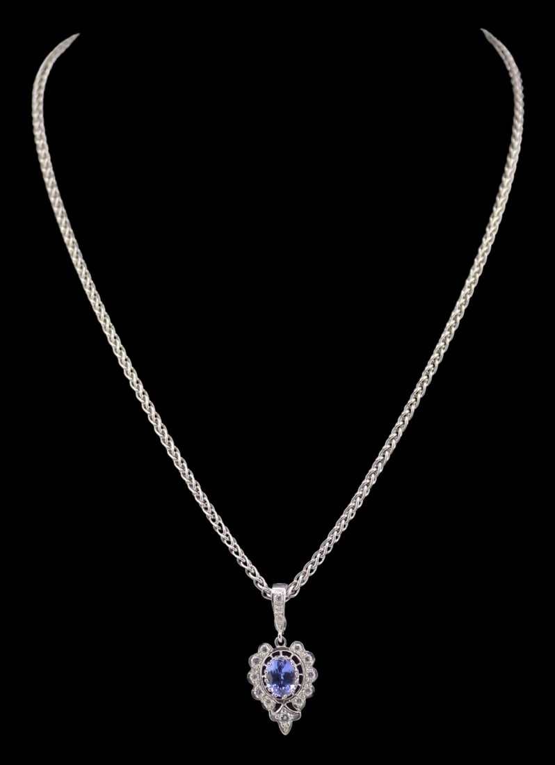 JEWELRY. 14kt Gold Tanzanite and Diamond Pendant. (1 of 8)