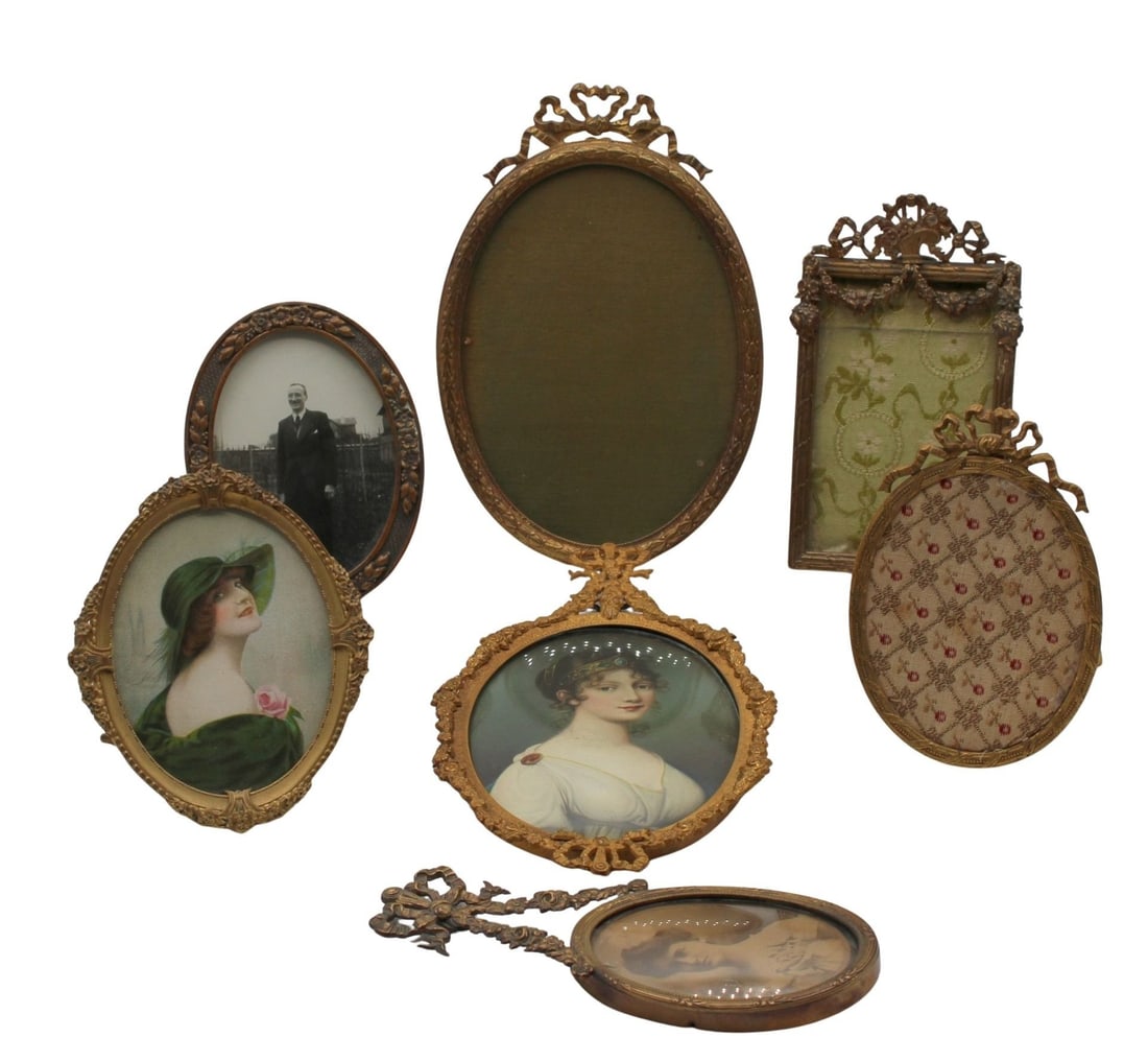 8 Of The Finest Quality Gilt Bronze Frames: 4" with portrait of a beauty (7.25"), 4" empty with ribbon crown (6.25"), 1 with photo of lady (5.5" x 2.25"), 1 with lady in green bonnet (4" x 3.5") marked Fr