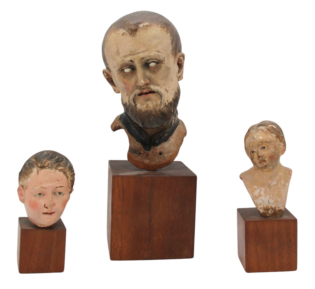 3 Antique Continental Terracotta Heads of Saints &: Other. From a Bronxville, NY estate. Dimensions: Largest 5" h and 8.5" h with stand; Female bust 3" and 5" with stand; boy 2.25" and 3.5" with stand.