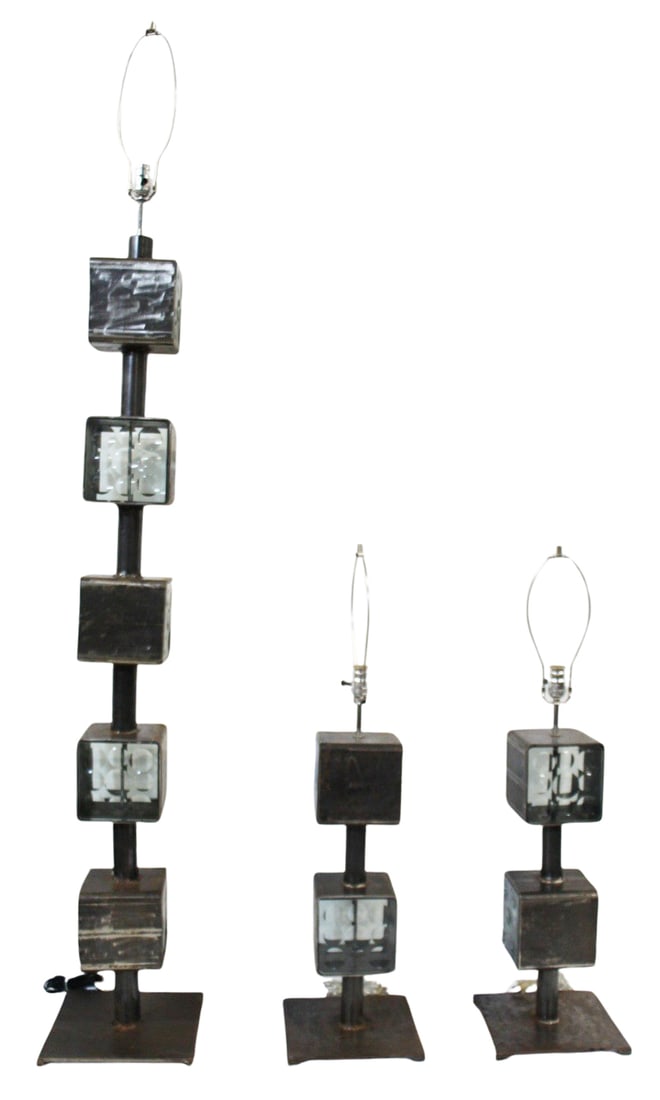 FELICIANO BEJAR Signed Metal Lamps.: Includes a floor lamp and a pair of table lamps. Signed on glass. From a New Jersey estate. Dimensions: Floor: 60" x 11" x 11" & Pair 23" x 10" x 10".