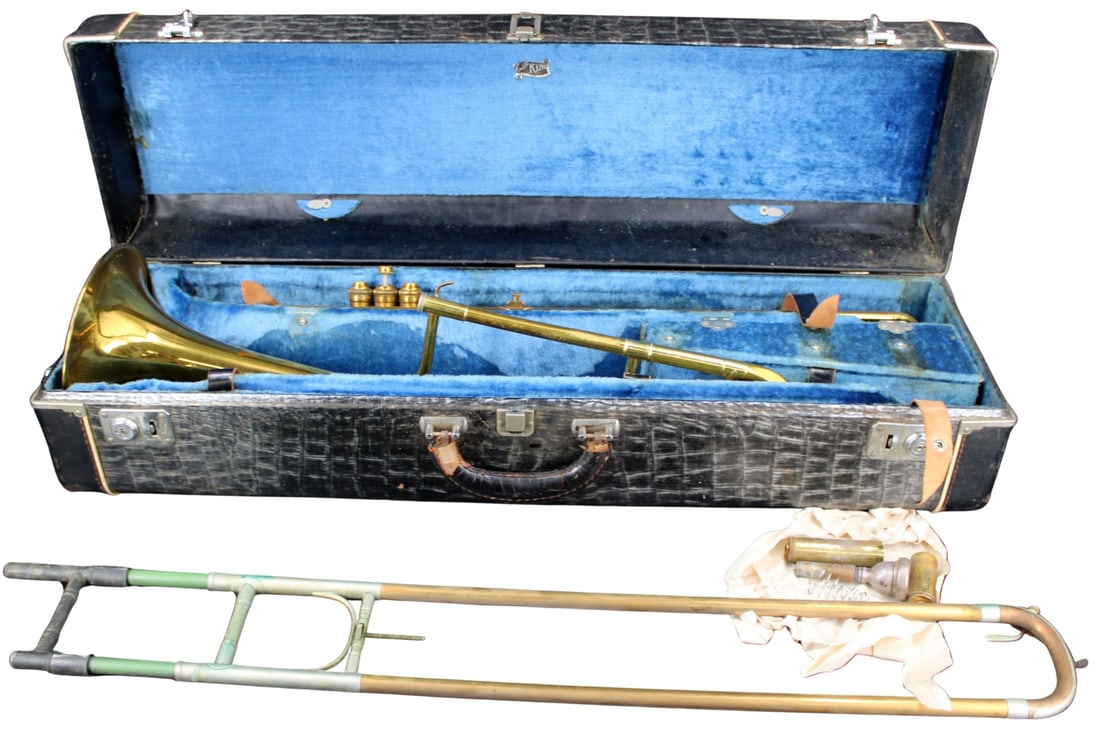 King 3B Concert Trombone In Hard Case: A King 3B Concert Trombone "King 3B Concert / The H. N. White Co./ Cleveland/ Ohio" on bell. With slide (no name) serial #235013. With piece with 3 valves, no name, serial number #371199. Co