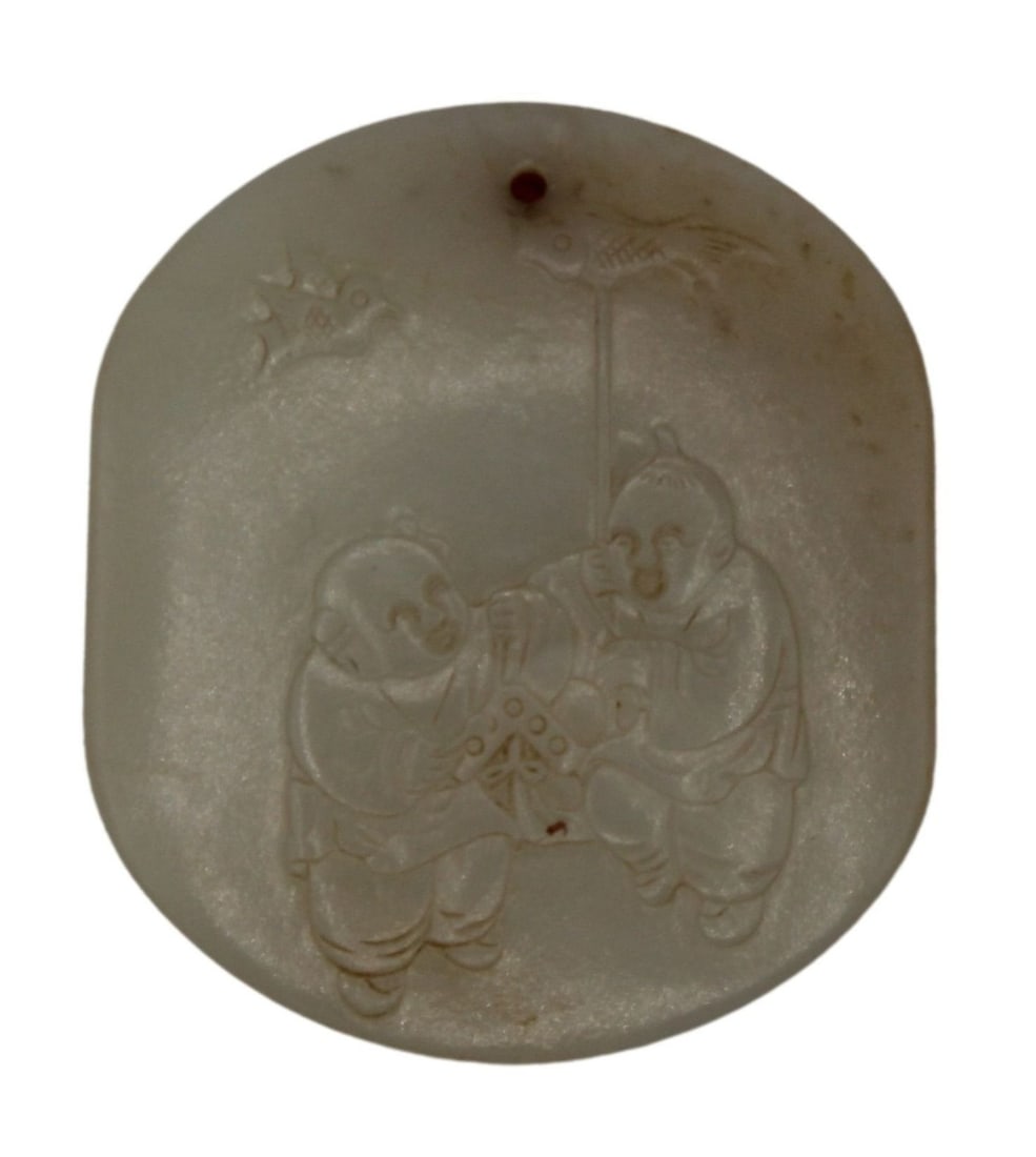 Chinese White Jade Carved Pendant of Festival: Chinese white jade carved pendant depicting a festival. The front features two people in celebration, the back features a carving of bamboo. Small hole to tie necklace through. Total approx. weight of