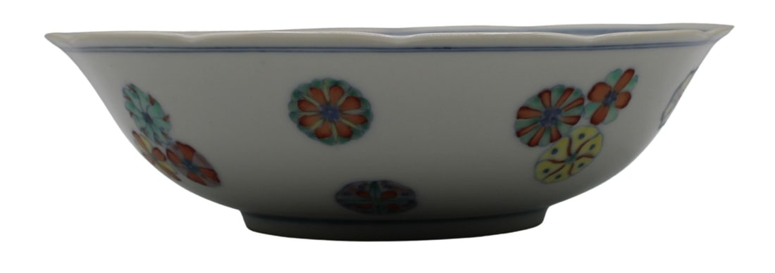Chinese Famille Rose Flower-Ball Bowl.: Chinese enamel bowl in white with blue line work and multicolored pendants throughout. Rim of the bowl is petal-shaped. Pendants vary is color, size & pattern. There is a blue 6-character mark on 