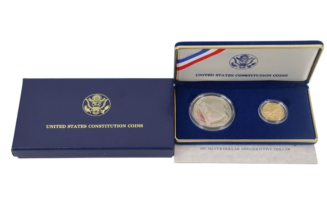 NUMISMATICS 1987 2-Coin Commem Constitution Proof: Set. Including (1) 1987 W $5 Proof Constitution Commemorative gold coin, struck in .900 fine gold. The total mintage for this date & mint: 651,659. (1) 1987 S $1 Proof Constitution Commemorative s