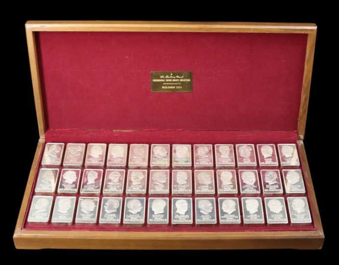 STERLING Danbury Mint Presidential Sterling Ingots: Complete set of (36) proof art bars issued by the Danbury Mint, each struck in 5,000 grains of sterling silver. Each bar features a high-relief portrait of a President of the United States on the