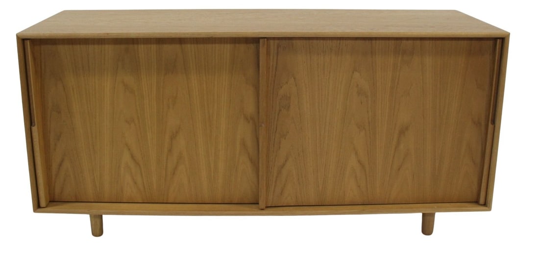 Modern Midcentury Style Sliding Door Cabinet.: Nice quality and patina and apparently unsigned. From an Eastchester, NY estate. - Dimensions: 28.50" h x 60" w x 20" d.