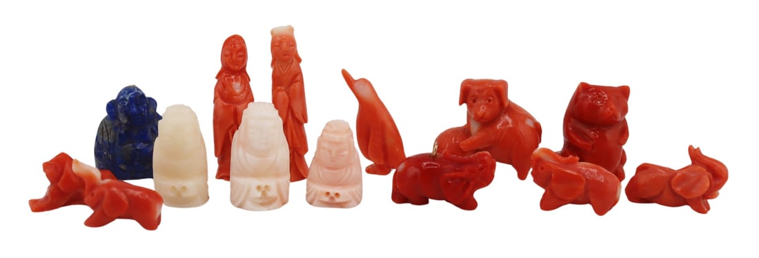 Collection of Carved Pendants Inc. Coral and Lapis: Lazulis. Collection of Chinese carvings including (2) carved salmon coral pendants of QuanYin; (3) carved salmon coral pendants of elephants with raised tusks; a carved salmon coral penguin pendant; a
