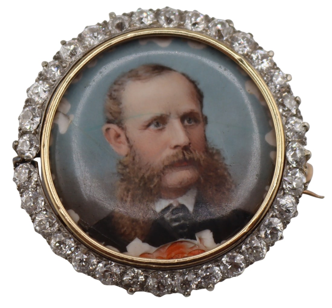 JEWELRY. Signed Matheiu Deroche Gold and Diamond: Portrait Brooch. Antique French 13kt yellow gold circular brooch displaying a central signed Mathieu Deroche portrait plaque of a gentleman accented by a surround of (32) antique faceted diamonds set 