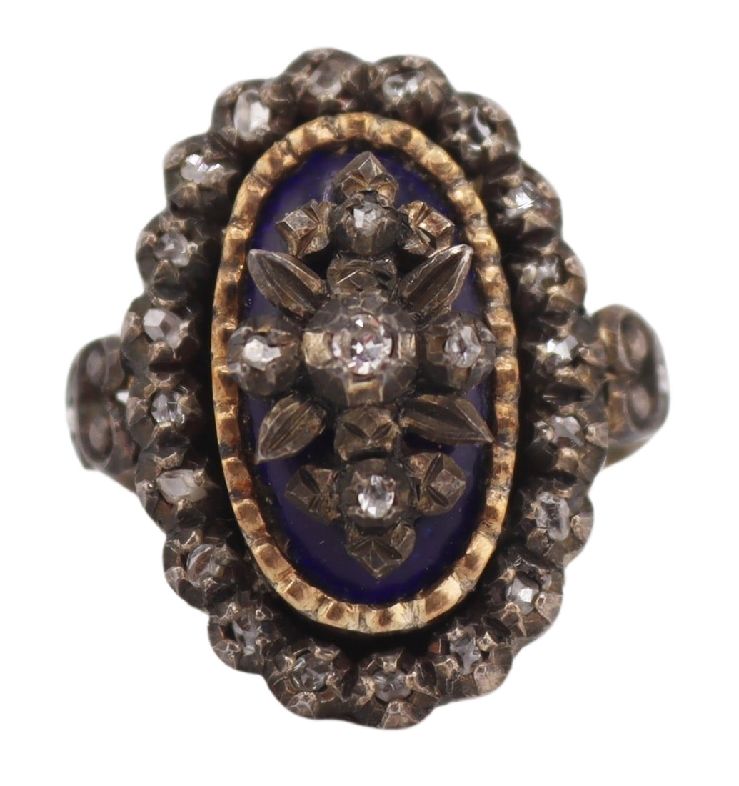 JEWELRY. Bague au Firmament Diamond and: Enamel Ring. 19th century Bague au Firmament or "Ring of Heavens" silver topped gold ring displaying a central panel of (5) silver pinched collet set diamonds set atop royal blue enamel, and