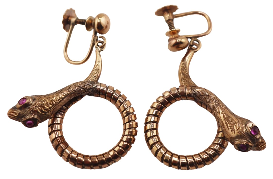 JEWELRY. Pair of Signed English 9ct Gold Snake: Earrings. Pair of signed S&P English 9ct yellow gold coiled snake form earrings with round ruby cabochon eyes, and screw backings. Stamped verso, "S&P 9 .375" with a city stamp of Bi