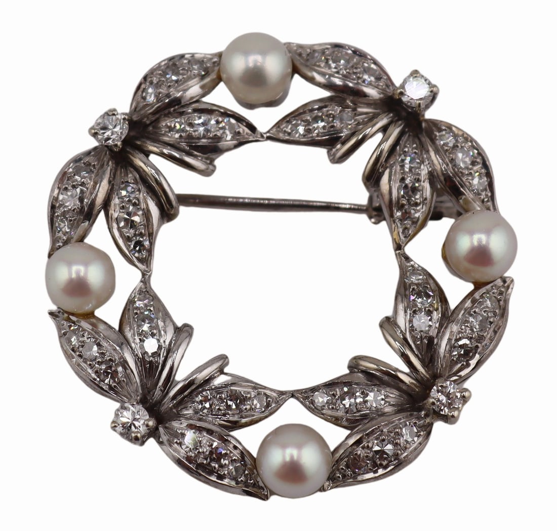 JEWELRY. Signed RMU 14kt Gold, Pearl and Diamond: Brooch. Signed RMU 14kt white gold wreath form brooch accented by (4) pearls, (4) prong-set round faceted diamonds, and pave single cut diamond accents. Stamped, "RMU 14K". Total approx. wei