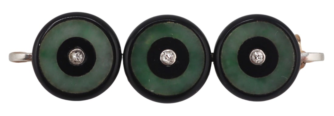 JEWELRY. Art Deco French 18kt Onyx, Jade and: Diamond Brooch. Art Deco signed French 18kt white gold brooch displaying (3) circular pendants comprised of onyx, and jade with central round faceted diamonds. The three pendants are stamped verso wit