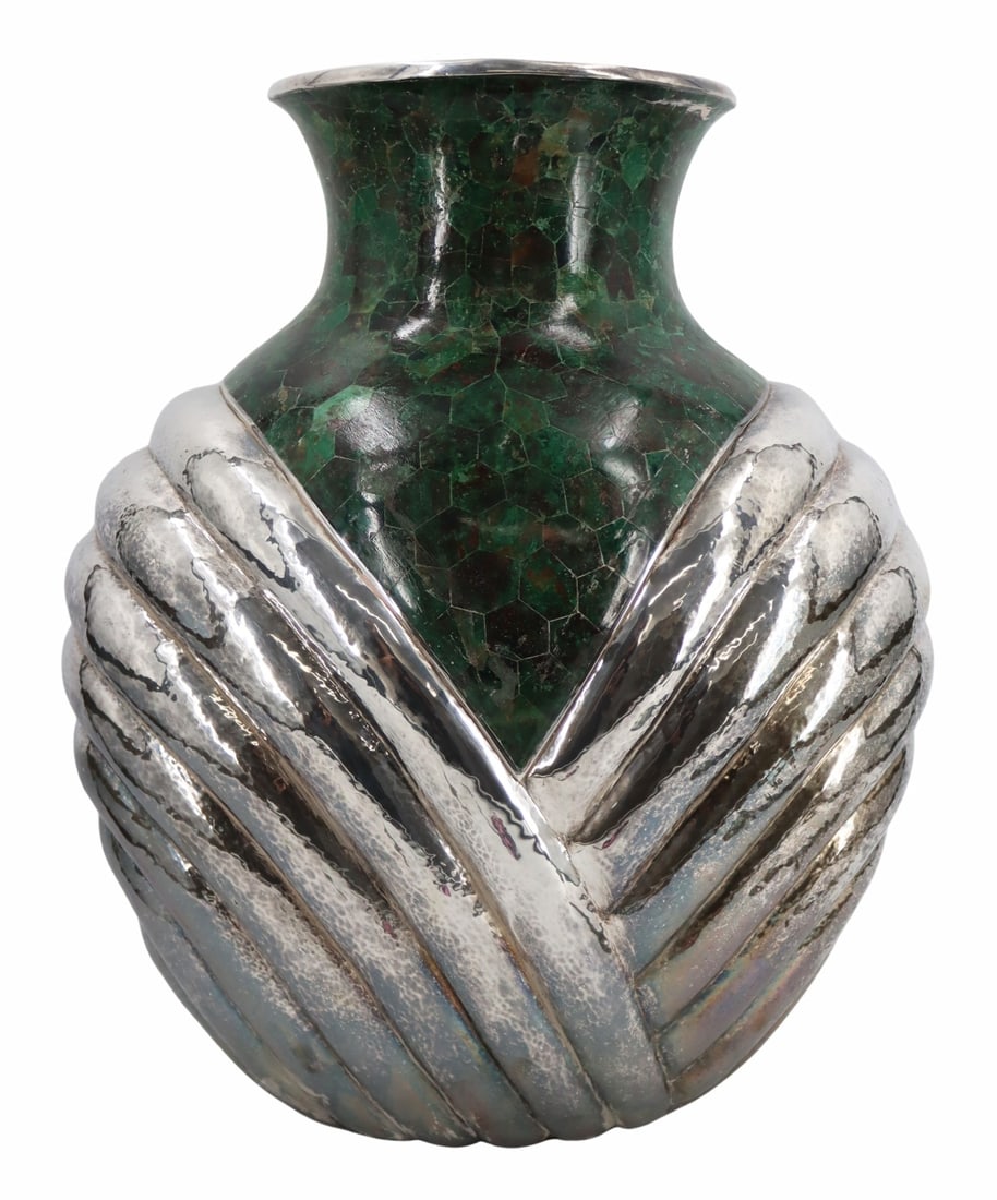 SILVERPLATE. Large Los Castillo Turquoise Vase.: Large Los Castillo hand hammered silverplate vase accented by panels of turquoise to the neck and shoulders. Stamped to the underside, "Los Castillo Taxco Hecho en Mexico TA-01 Plateado". Fr