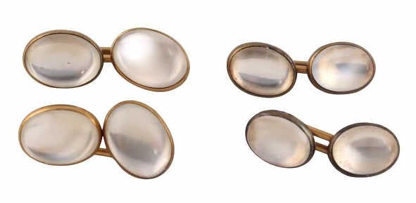 JEWELRY. Black, Starr & Frost 14kt Gold Cufflinks.: A pair of Black, Starr & Frost 14kt yellow gold double sided cufflinks accented with bezel-set moon stone cabochons - stamped, "BS&F 14K"; and a pair of 14kt yellow gold double sided