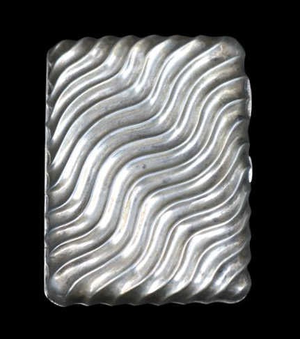 SILVER English Silver Textured Wave Cigarette Case: A well executed English silver cigarette case executed in a textured wave pattern with a gilt interior. Bearing a city mark of London, maker's mark of Wright & Davies (William Thomas Wright & 
