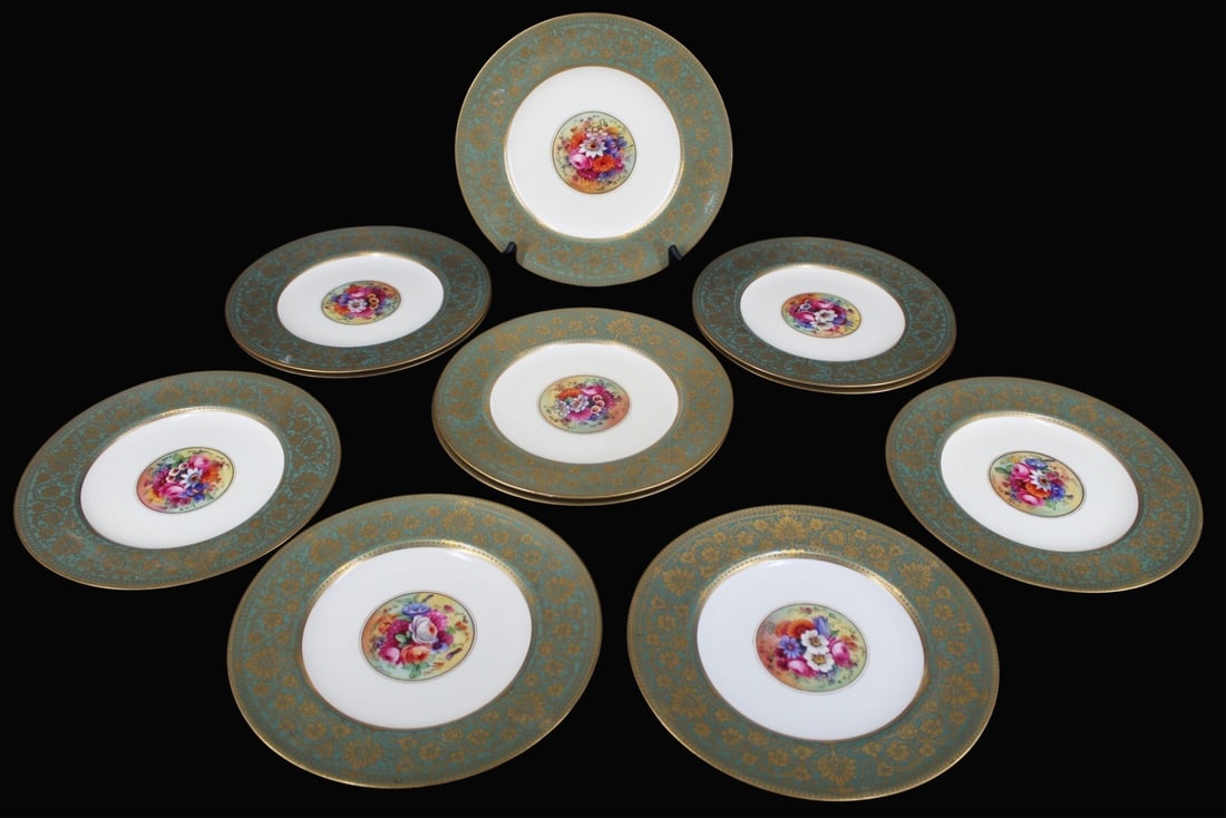 Set of 11 Royal Worcester for Tiffany Plates: A set of 11 Royal Worcester for Tiffany hand painted service plates, decorated by Ernest Barker. Marked "Tiffany & Co / New York / Royal Worcester / Made In England". Each plate 10.75" D. From a