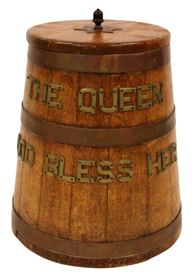 British Royal Navy Brass Bound Oak Grog Barrel: British Royal Naval rum tub or grog tub with six-point star and acorn shaped turned finial. Inside barrel there is a metal removable liner. From a New Jersey estate. - Dimensions: 19.75" h x 14.5"