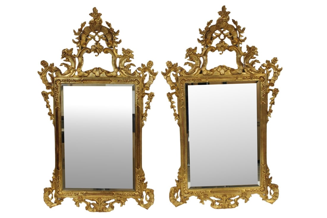 Large & Impressive Pair Of Carved Giltwood Mirrors: Good large size, carved all over and with nice patina. Possibly Italian. From a Bedford, NY estate. - Dimensions: 60" h x 36" w.