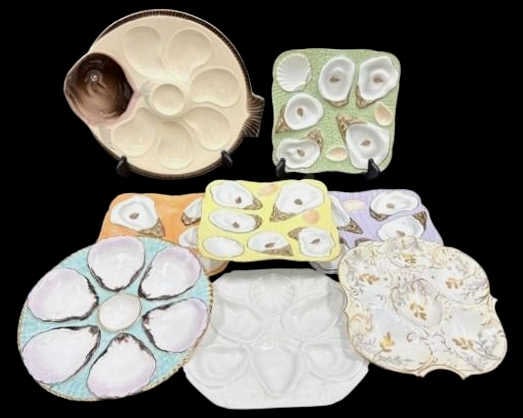 8 Assorted Vintage Porcelain Oyster Plates.: Includes (4) matching oyster plates (7.75" square) purple,orange, yellow,green, 1 Blue Round (9") stamp CT with eagle Carl Tielsch. 1 Fish Face Plate (12"x10.50") Stamp Longwy France. 1 Square White P