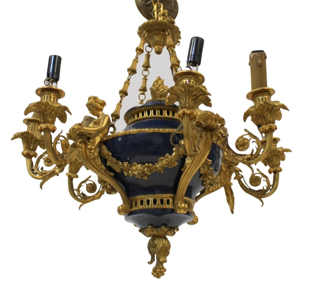 Antique & Fine Quality Gilt Bronze & Enameled 8: Arm Chandelier. Great gilt patina on the bronze figural arms and the bronze heavy with nice figures holding the arms. From a Queens, NY estate. - Dimensions: 24" h x 24" w.